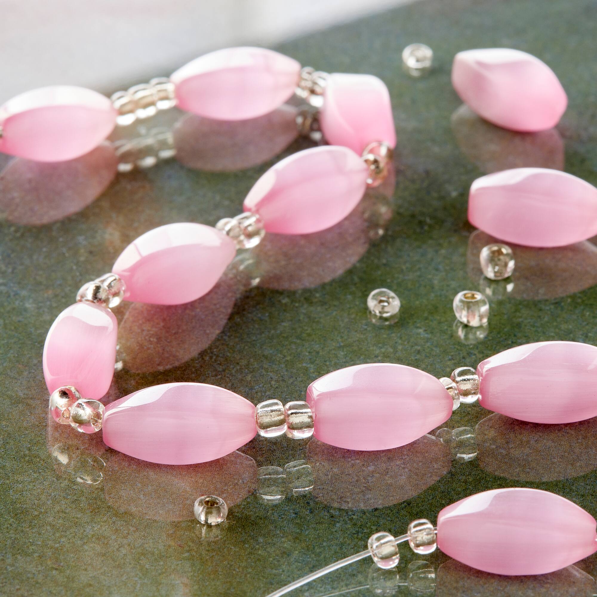 Pink Cat's Eye Glass Twist Beads, 16mm by Bead Landing™
